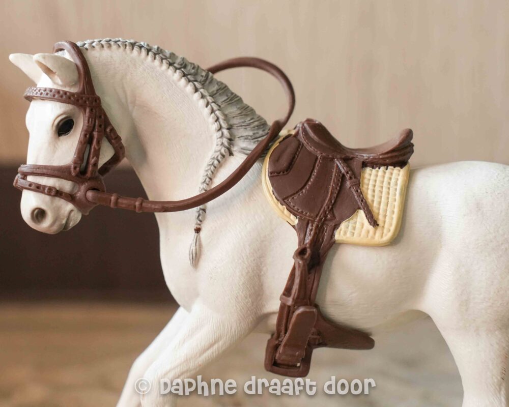 Schleich zadel en hoofdstel - springset met creme dekje